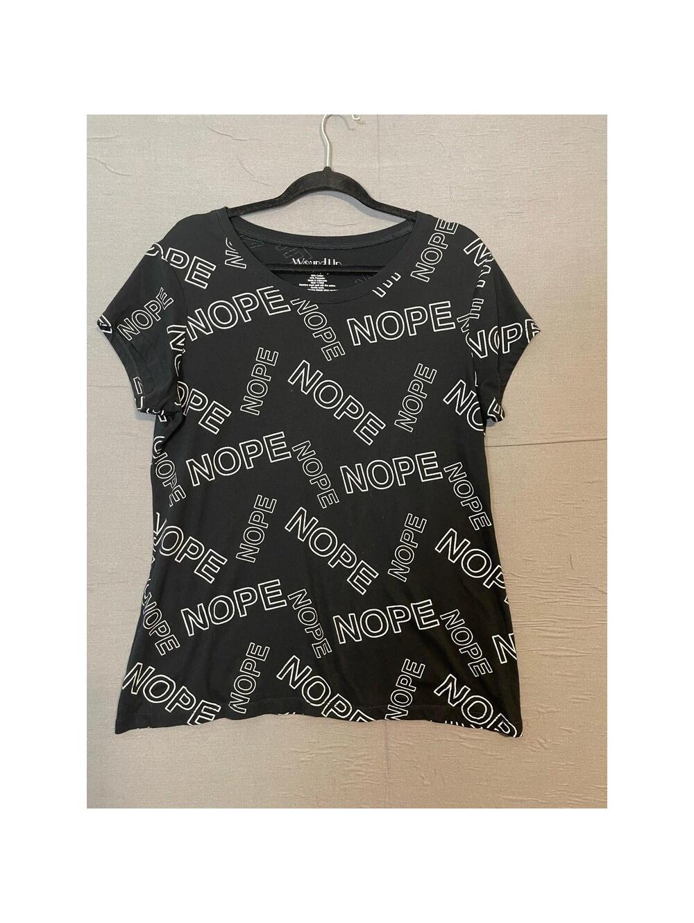 Wound up woman TShirt size XXXL (21) with “NOPE” print on it